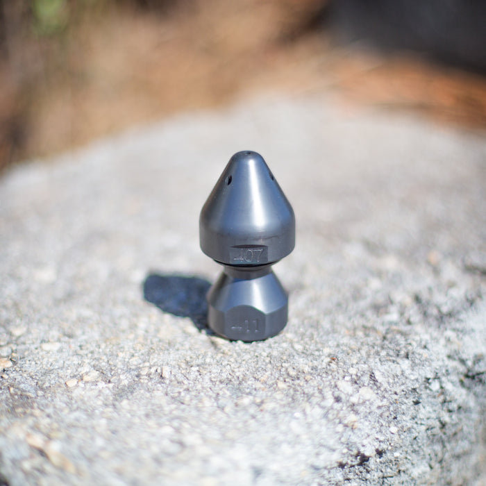 US Jetting RPD Egghead Penetrator nozzle made of case‑hardened steel, shown with rounded nose and two‑piece removable cap design for easy cleaning, featuring forward and rear jet ports for penetrating blockages, heavy grease, and root masses; high‑pressure sewer jetting nozzle compatible with 1/2", 3/4", and 1" hoses, supporting 14–65 GPM and 2,000–10,000 PSI.