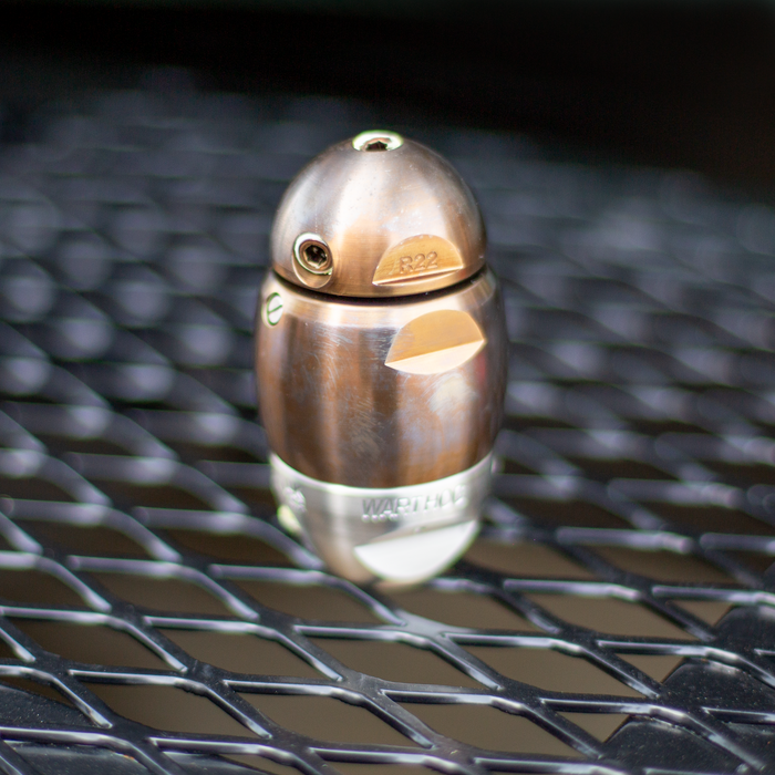 Warthog X sewer jetter nozzle with stainless steel body and brass jet components, engineered for high‑pressure pulling, descaling, and cleaning 3–8 inch sewer and drain lines. Features adjustable jet sizes, premium carbide wear parts, viscous‑fluid maintenance ports, and a compact, rebuildable design for powerful cutting and pipe‑wall cleaning performance.