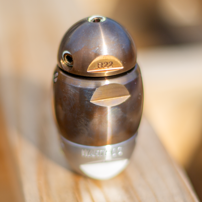 Warthog X sewer jetter nozzle with stainless steel body and brass jet components, designed for high‑pressure pulling, descaling, and cleaning 3–8 inch sewer and drain lines. Features adjustable jet sizes, premium carbide wear parts, viscous‑fluid maintenance ports, and a compact, rebuildable design engineered for maximum cutting and pipe‑wall cleaning power.