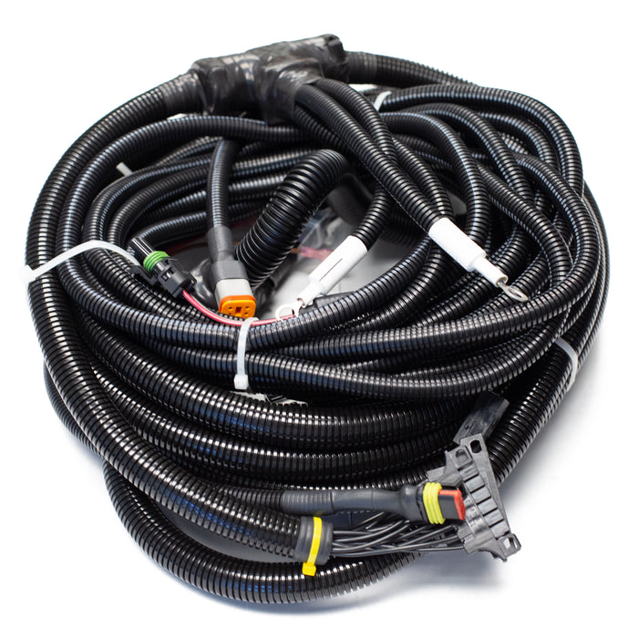 Tier 3 engine wiring harness with multi‑pin connectors, corrugated protective loom, and control‑panel leads for US Jetting jetter systems.