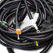 Tier 3 engine wiring harness with multi‑pin connectors, corrugated protective loom, and control‑panel leads for US Jetting jetter systems.